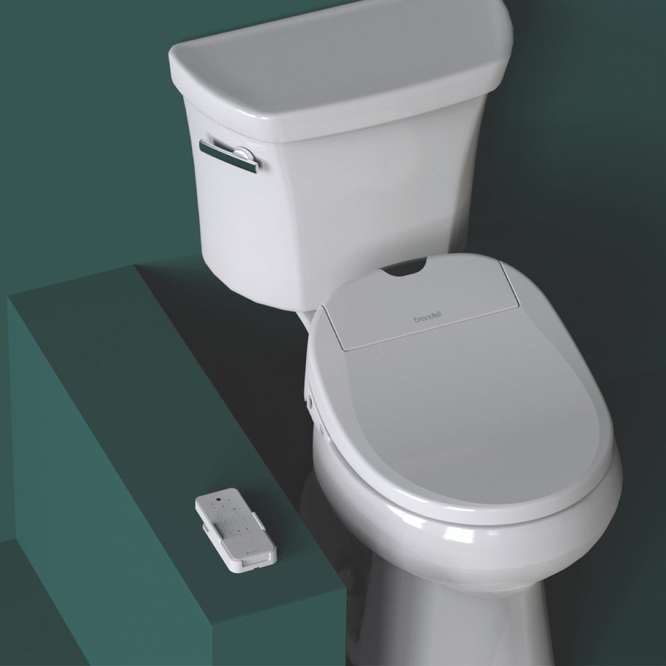 White toilet with Brondell Swash 1000 Electric Bidet Seat installed on a green gradient background